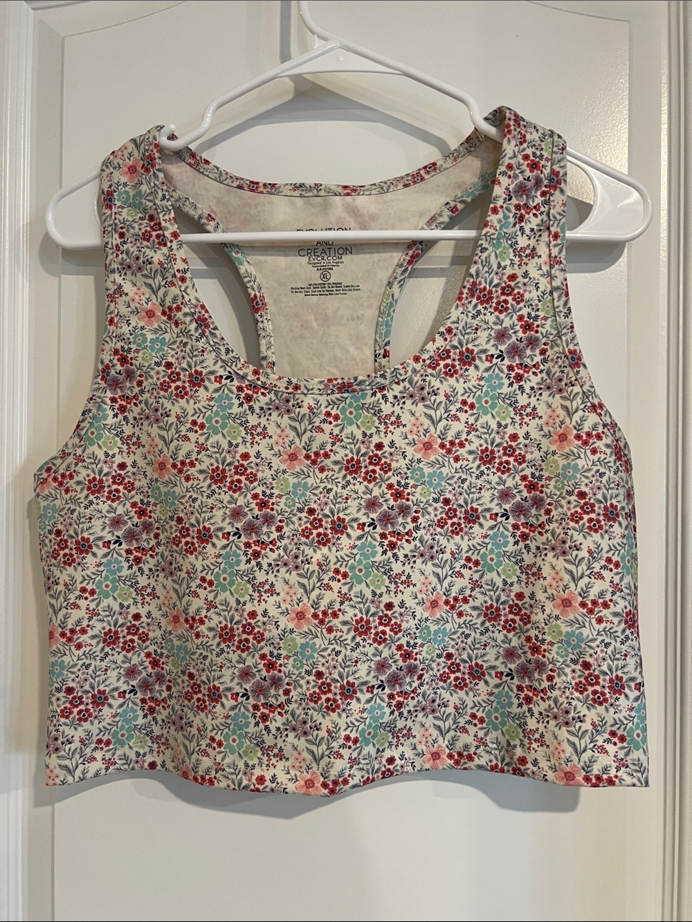 Evolution and Creation White Floral Racerback Crop Top with Pink & Teal Flowers